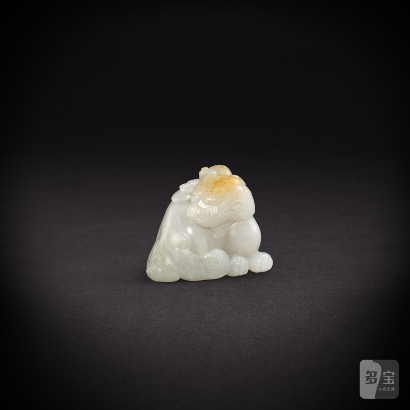A white jade 'mythical beast' pendant, Qing dynasty, 18th - 19th century | 清十八至十九世紀 白玉瑞獸形墜